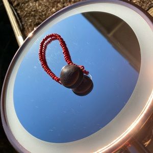 Red deers eye protection bracelet